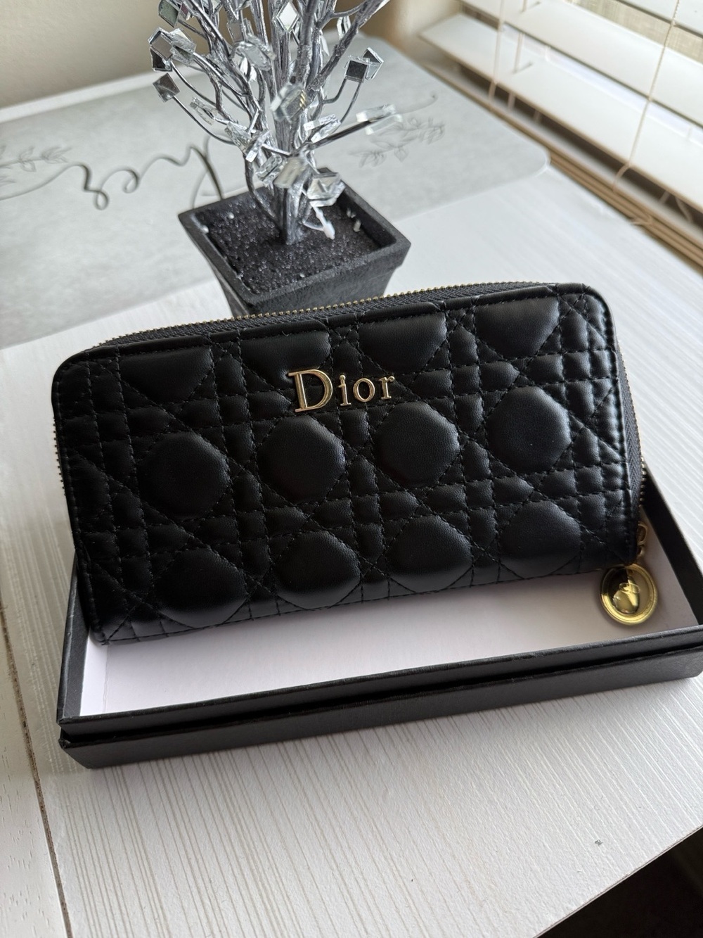 Black Quilted Zip-Around Wallet with Gold Logo